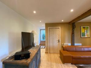 Appartements Ferme Point du Jour avec sauna et jacuzzi : photos des chambres