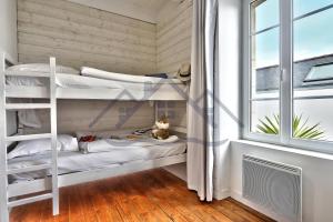 Maisons de vacances LocaLise - M5 - Maison de vacances sur le port de Lechiagat - terrasse entierement close - Wifi inclus - Draps inclus - Animaux bienvenus : photos des chambres