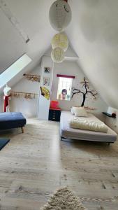 Maisons de vacances la petite maison en bois bleue : photos des chambres