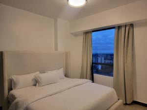 modern executive three bedroom apartment which features a swimming pool, state of the art fully equipped gym andmodern unmatched luxurious facilities which offfers luxury and comfort