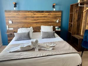 Hotels Logis Hotel de la Poste : photos des chambres