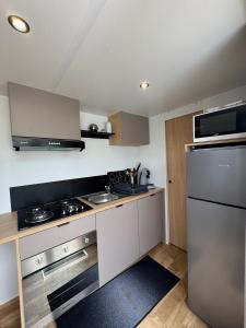 Maisons de vacances Mobile Home 146, 5 pers Camping Siblu 4 etoiles le Lac des Reves : photos des chambres