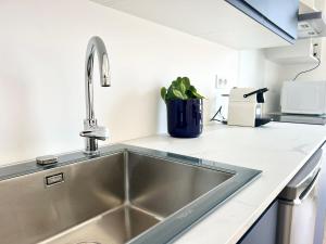 Appartements Le Hausmanien, a deux pas du port : photos des chambres
