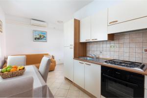 Apartments by the sea Trogir - 24405