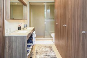 Nima Bay Oasis, Ground Floor with Private Garden