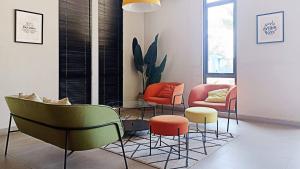 Kostaycation Front Of Kampus Esa Unggul Tangerang