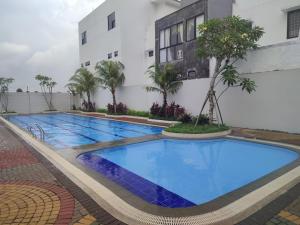 Kostaycation Front Of Kampus Esa Unggul Tangerang