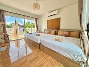 บ้านหมอบิวพูลวิลล่า Baanmhorbewpoolvilla