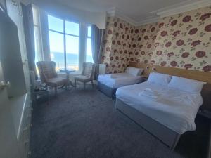 Family Room with Sea View room in Boston Hotel