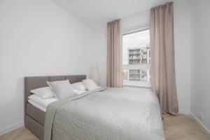 Cozy Apartment in Warsaws Praga District with Parking by Noclegi Renters