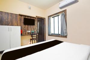 Super Collection O Gandhi Ghat Formerly Sai Resorts