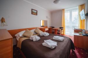 Double Room with Balcony with passage to Zakopane baths room in Pensjonat Antałówka
