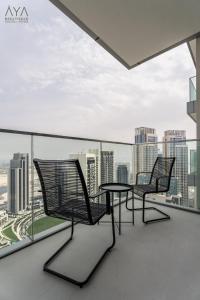 Elegant Luxury Apartment with Stunning Lake Views in Dubai Creek Harbour By ĀYA Boutique