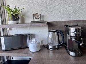 Appartements Le Scarlett- Confort a Palavas-Plage a proximite, Terrasse, Piscine et Clim -LaConciergerieByNina : photos des chambres