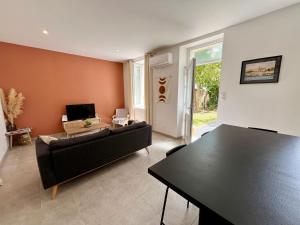 Appartements Le Riquet - Parking et jardin prive, clim, RDC : photos des chambres