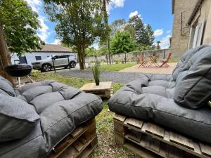 Appartements Le Riquet - Parking et jardin prive, clim, RDC : photos des chambres