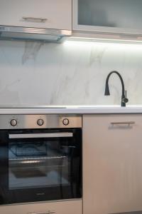 SithoniaRS Alfi Luxury Ground Floor Apartment with Private Garden