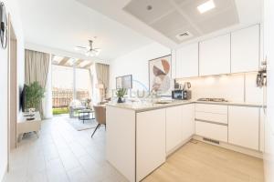 New 1 BR with 2 Balconies Near Circle Mall, Luma22 West Tower, JVC By Deluxe Holiday Homes