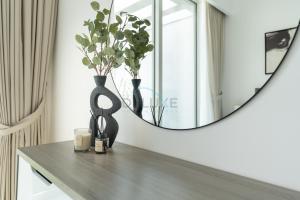 New 1 BR with 2 Balconies Near Circle Mall, Luma22 West Tower, JVC By Deluxe Holiday Homes