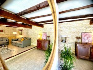 Maisons de vacances Grange authentique avec vue, piscine chauffee et Wifi : photos des chambres