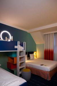 Hotels Grand Magic Hotel Marne La Vallee : photos des chambres