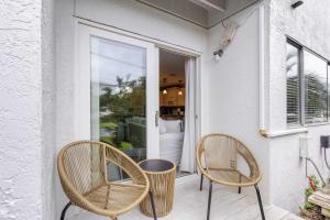 Coastal-Chic Condo Steps from the Sand