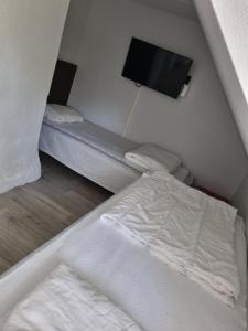 Quadruple Room with Shared Bathroom room in Nyckelbo Vandrarhem