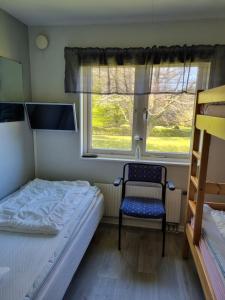 Triple Room with Shared Bathroom room in Nyckelbo Vandrarhem