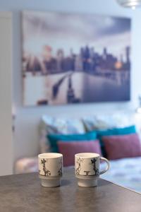Appartements Le cocon des Monts d'Or : photos des chambres