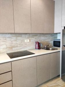 Hillside Apartment with Infinity Pool and Sea View