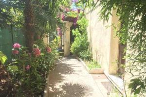 Appartement en rez de jardin centre ville