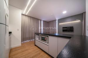 402 Flat Moderno e Bem Localizado a 120 metros da praia de Bombinhas Até 4 Pessoas