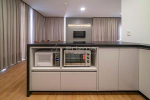 402 Flat Moderno e Bem Localizado a 120 metros da praia de Bombinhas Até 4 Pessoas