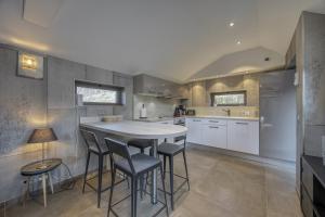Appartements Le pigeonnier : photos des chambres