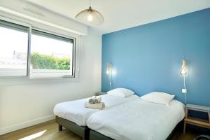 Appartements Le cottage bleu - 400 m de la mer - parking : photos des chambres