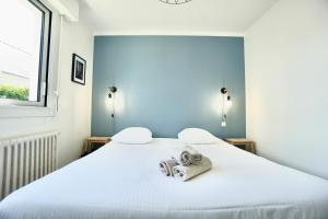 Appartements Le cottage bleu - 400 m de la mer - parking : photos des chambres