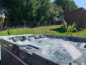 Chalets Chalet et jacuzzi au coeur du Nivernais : photos des chambres