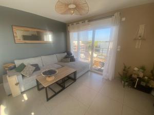 Appartement toit terrasse, piscine, plages à 10min et parking