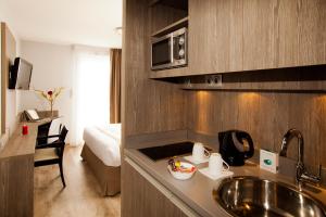 Appart'hotels Sejours & Affaires Grenoble Marie Curie : photos des chambres