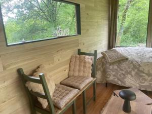 TiNid, cabane chaleureuse plongée dans la nature