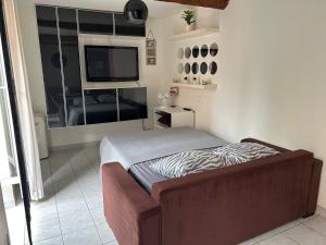 Appartements Appartement-Studio : photos des chambres