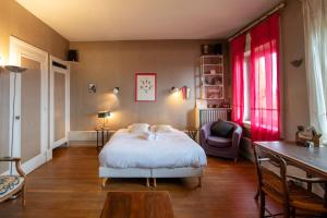 Appartements La croix des Rameaux- charming house near Lyon : photos des chambres