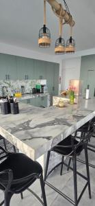 SKY HOUSE con vista al mar