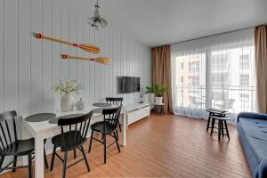 Nowa Motława Riverside Suites with Free Parking by Downtown Apartments