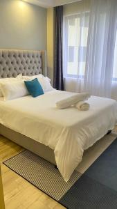 elegantly and beautifully furnished two bedroom apartment with well equipped gym heated swimming pool children playing ground and amazing scenic views