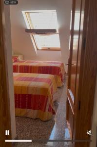 Piso dos dormitorios y gran terraza