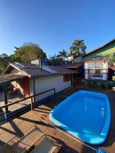 casa com piscina na praia do rosa
