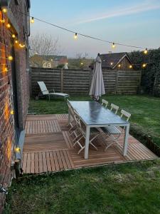 Jolie maison avec jardin.