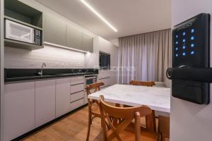 512 Flat Moderno e Bem Localizado a 120 metros da praia de Bombinhas Até 4 Pessoas