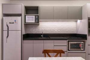 512 Flat Moderno e Bem Localizado a 120 metros da praia de Bombinhas Até 4 Pessoas